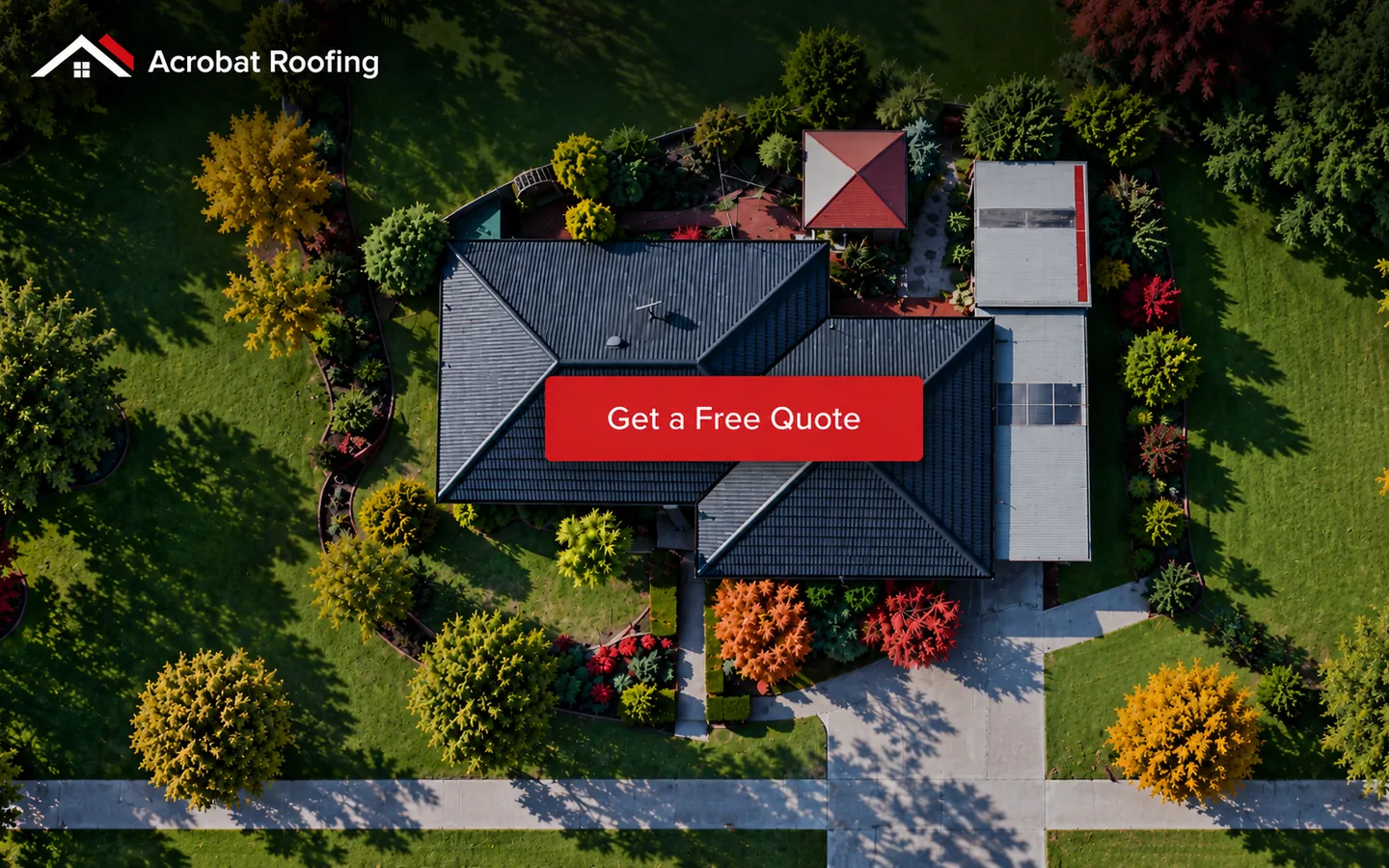 The old Acrobat Roofing website on desktop: an aerial photo of a dark tiled roof among gardens, with the logo and a single Get a Free Quote button.